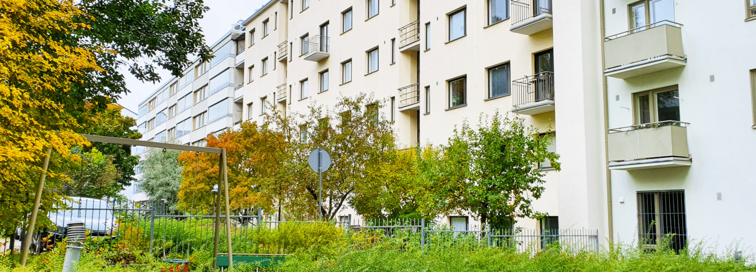 White apartment with playground